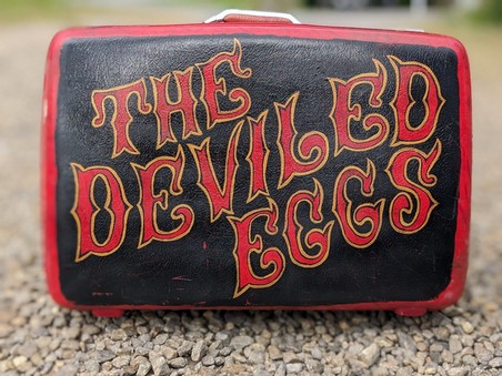 The Deviled Eggs's logo
